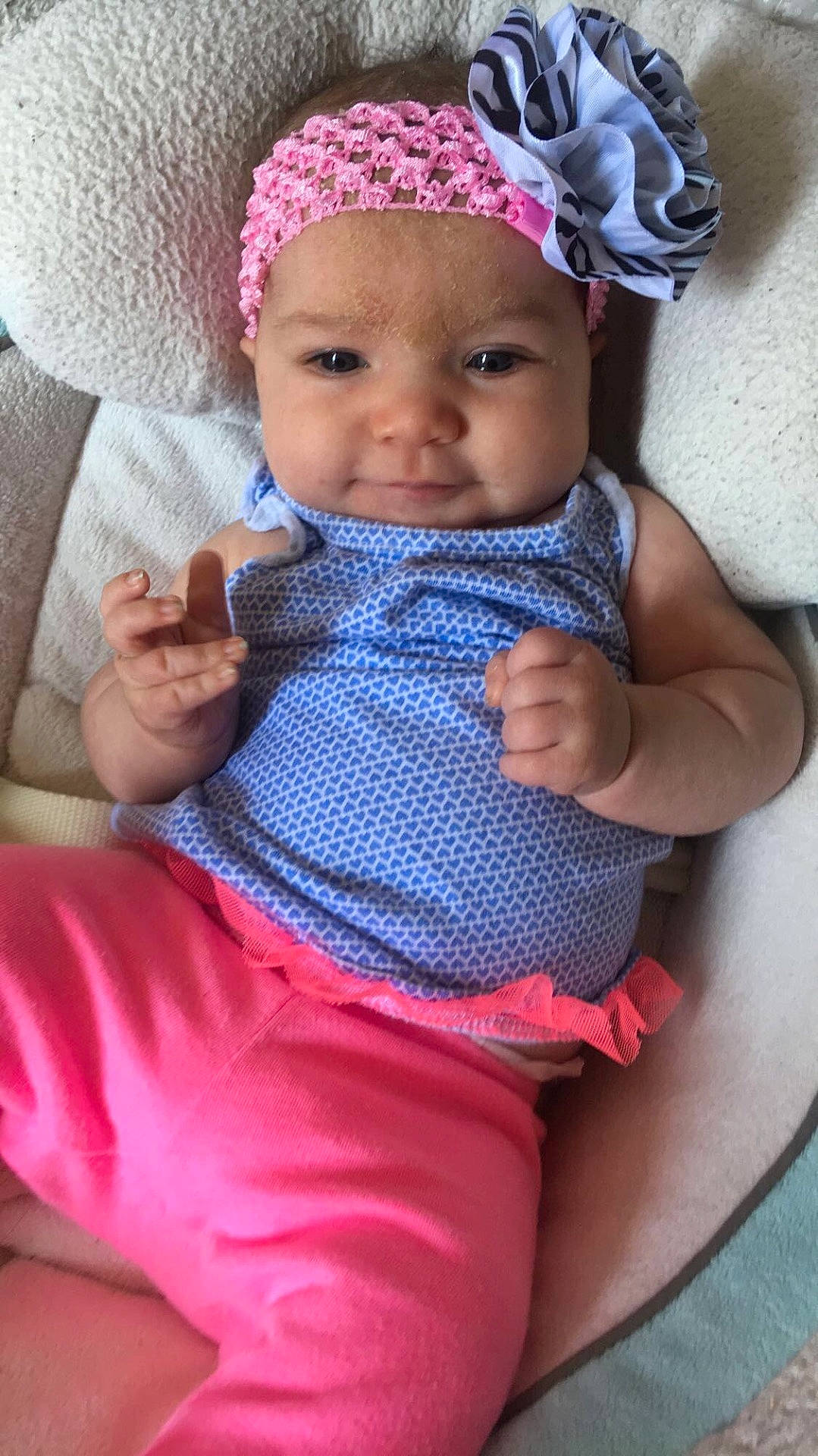 Elly is registered to the contest to win money with this photo: child, clothing, eye, girl, human_positions, image, infant, organ, person, pink, play, sitting, skin, toddler