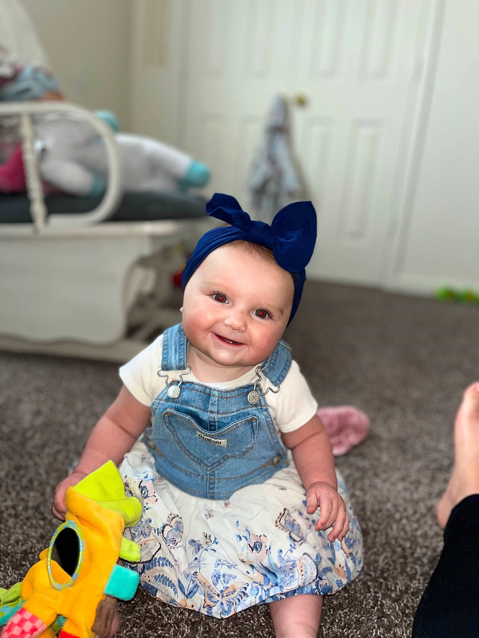 Audrey joined the competition — help win amazing prizes! baby, baby_toddler_clothing, baby_toys, child, costume, doll, electric_blue, fashion_accessory, figurine, fun, happy, head, joy, pattern, person, plastic, sitting, skin, sleeve, smile