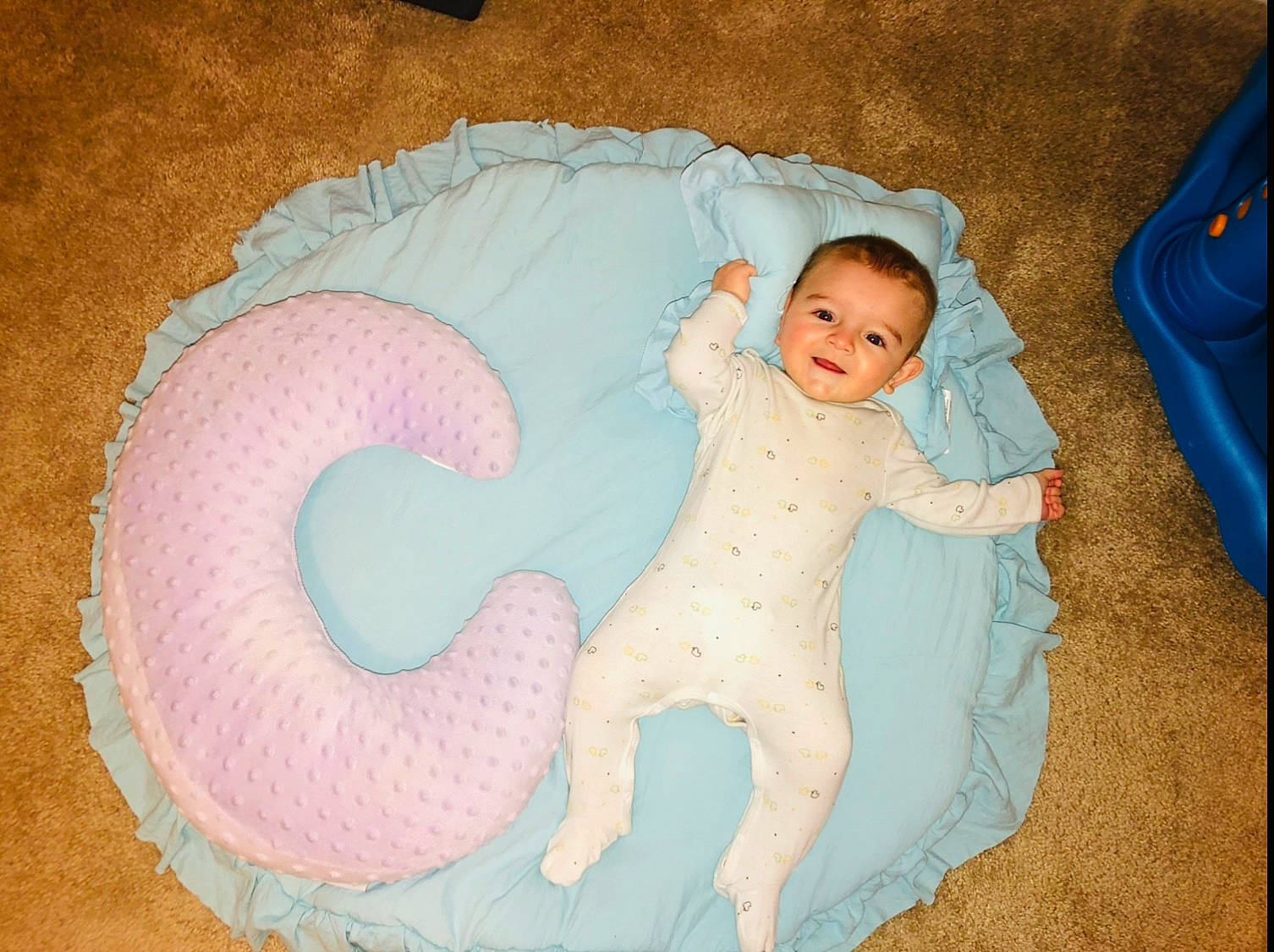 Cole joined the competition — help win amazing prizes! baby, baby_products, baby_toddler_clothing, baby_toys, cheek, child, circle, comfort, face, fictional_character, fun, head, joy, linens, pattern, person, pink, play, room, sitting