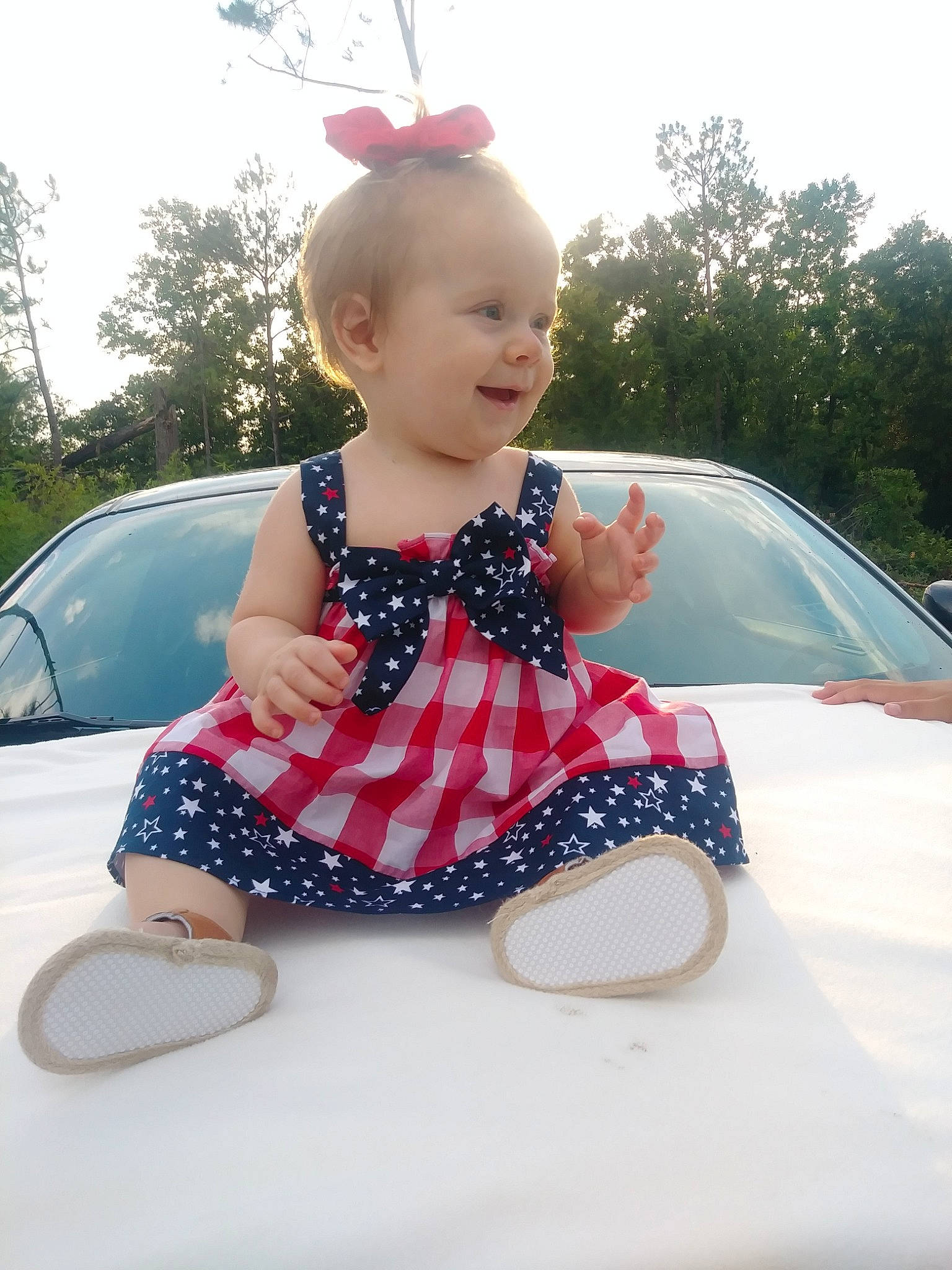 Regina joined the competition — help win amazing prizes! baby, baby_toddler_clothing, car, cheek, child, dress, ear, fashion_accessory, joint, pattern, person, pink, plant, sitting, skin, summer, toddler, vacation, vehicle