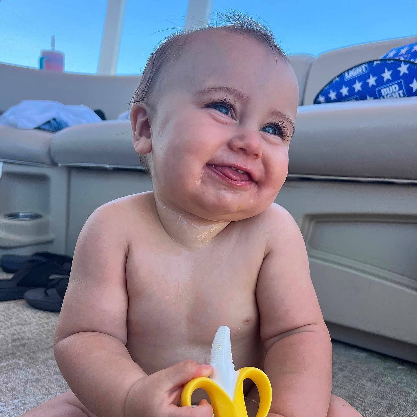 Atlas is registered to the contest to win money with this photo: baby, babylaughing, bodypart, couch, cream, cutlery, dessert, face, finger, food, furniture, hand, happy, head, person, photography, portrait, scissors, smile, spoon