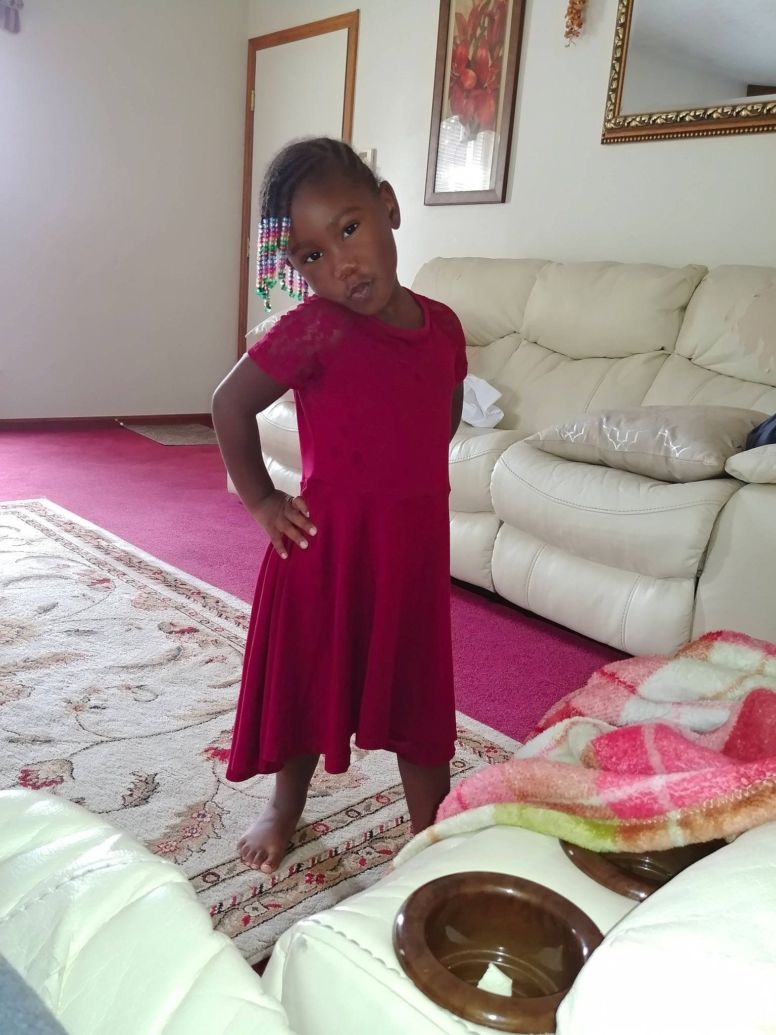 E'Milah joined the competition — help win amazing prizes! child, dress, formal_wear, furniture, leg, magenta, person, pink, room, sitting, textile
