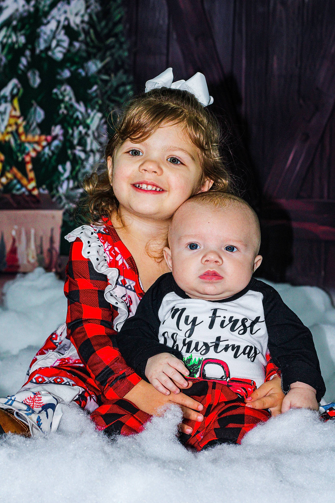 Georgia joined the competition — help win amazing prizes! baby, baby_toddler_clothing, child, event, face, flash_photography, fun, happy, human_body, iris, joy, person, plaid, sitting, skin, sleeve, smile, snow, standing, toddler
