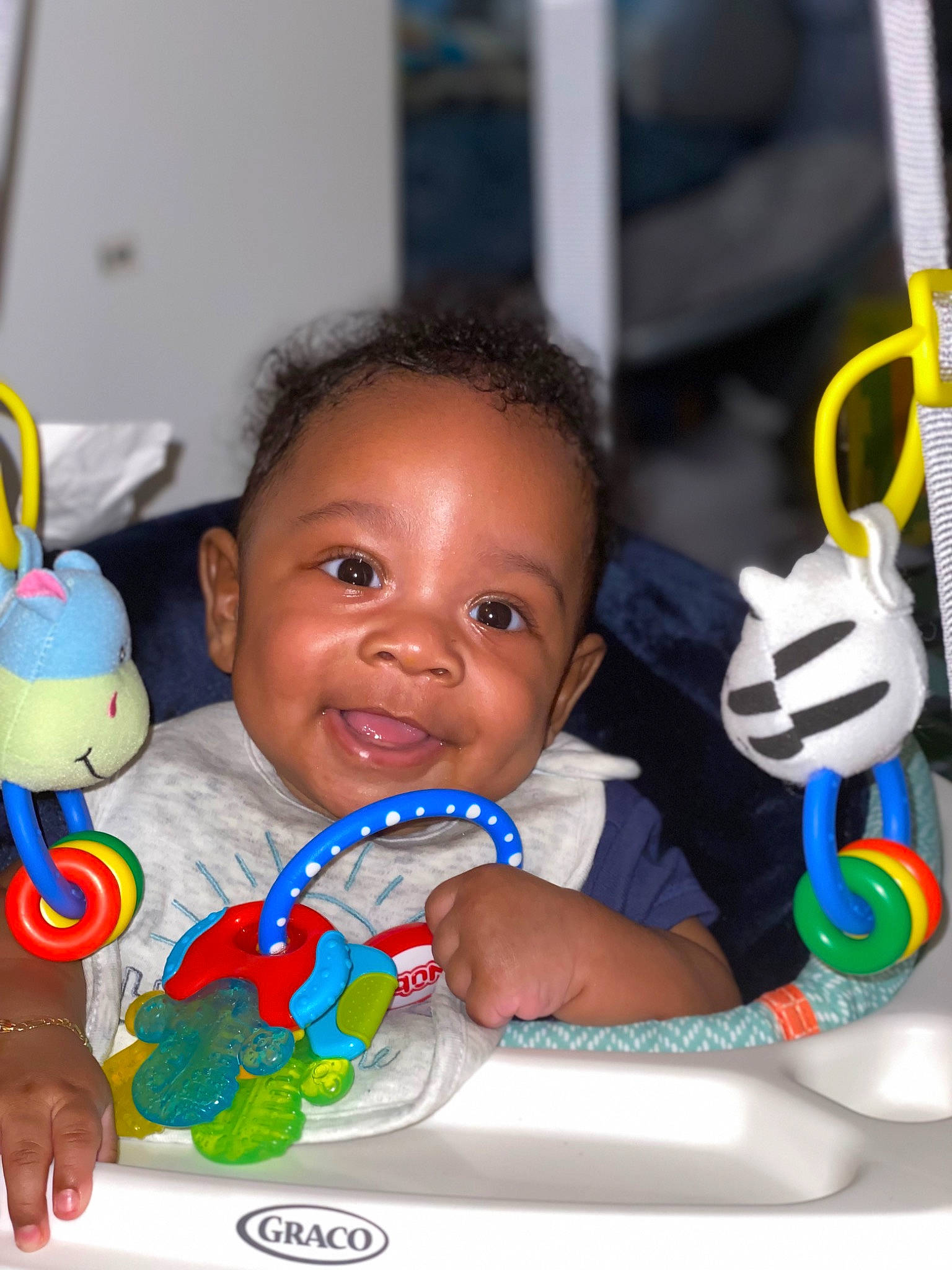 Kamren is registered to the contest to win money with this photo: arm, baby, baby_playing_with_toys, baby_products, baby_toys, child, event, finger, fun, hair, hand, happy, joy, nose, person, play, product, skin, smile, thumb