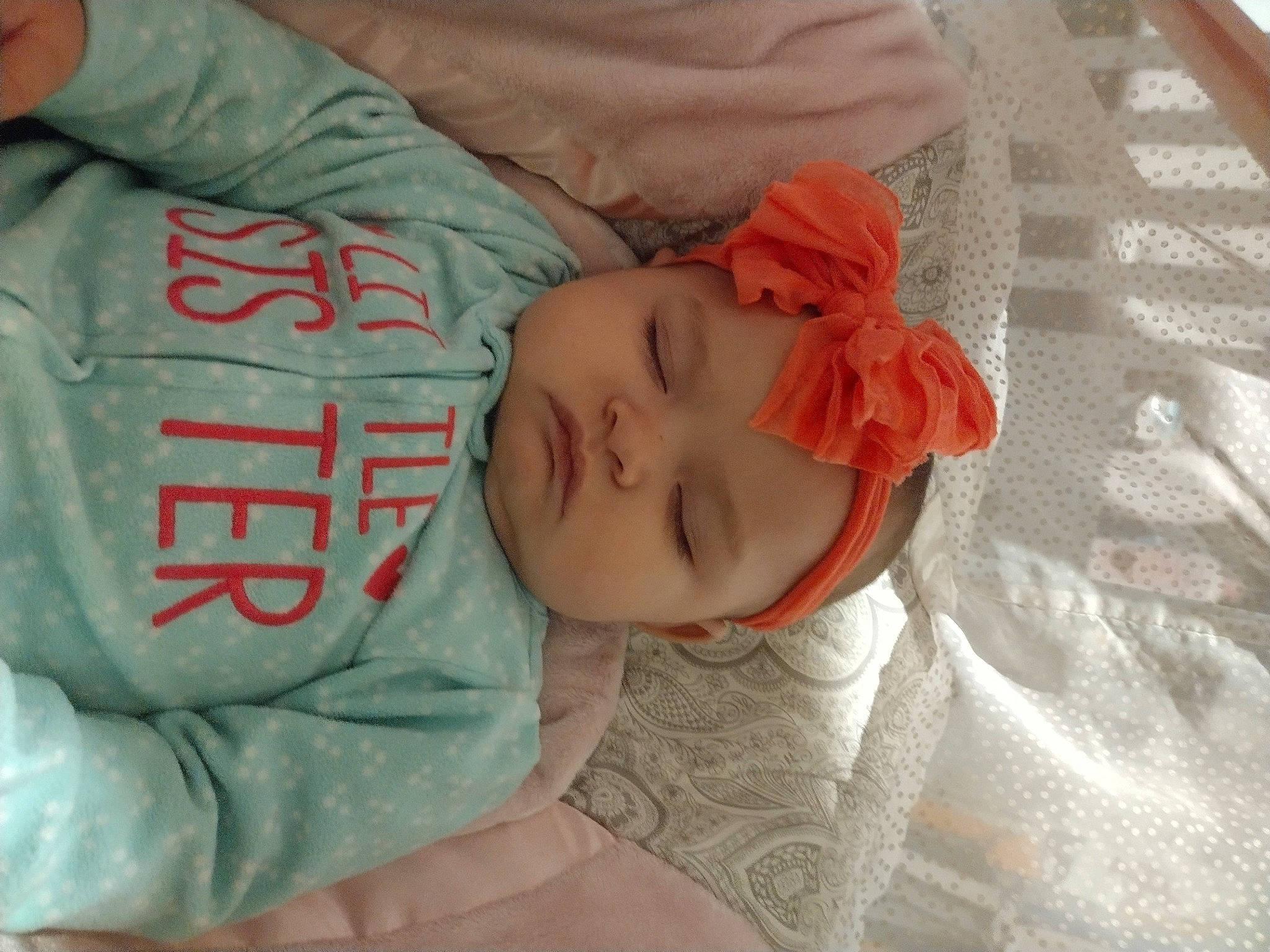 Erin is registered to the contest to win money with this photo: baby, baby_products, baby_toddler_clothing, bedtime, cheek, child, comfort, hat, headwear, linens, nap, person, product, room, sleep, sleeve, textile, toddler