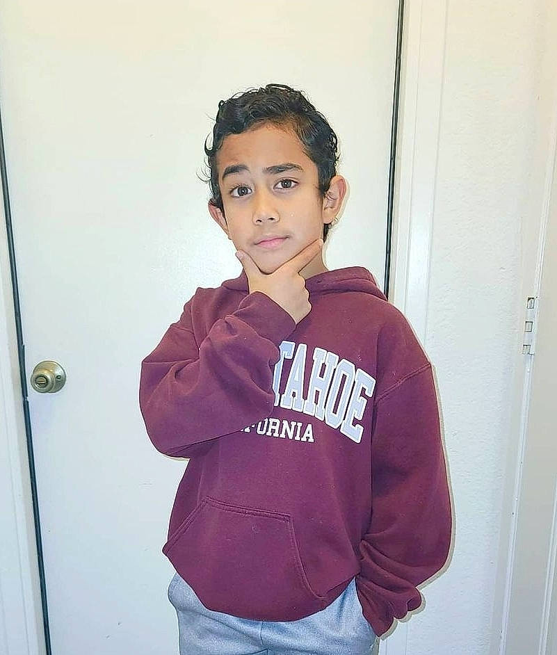 Allen is registered to the contest to win money with this photo: clothing, cool, denim, door, door_handle, home_door, hood, hoodie, jacket, jeans, maroon, outerwear, person, pocket, shoulder, sleeve, standing, street_fashion, sweatshirt, top