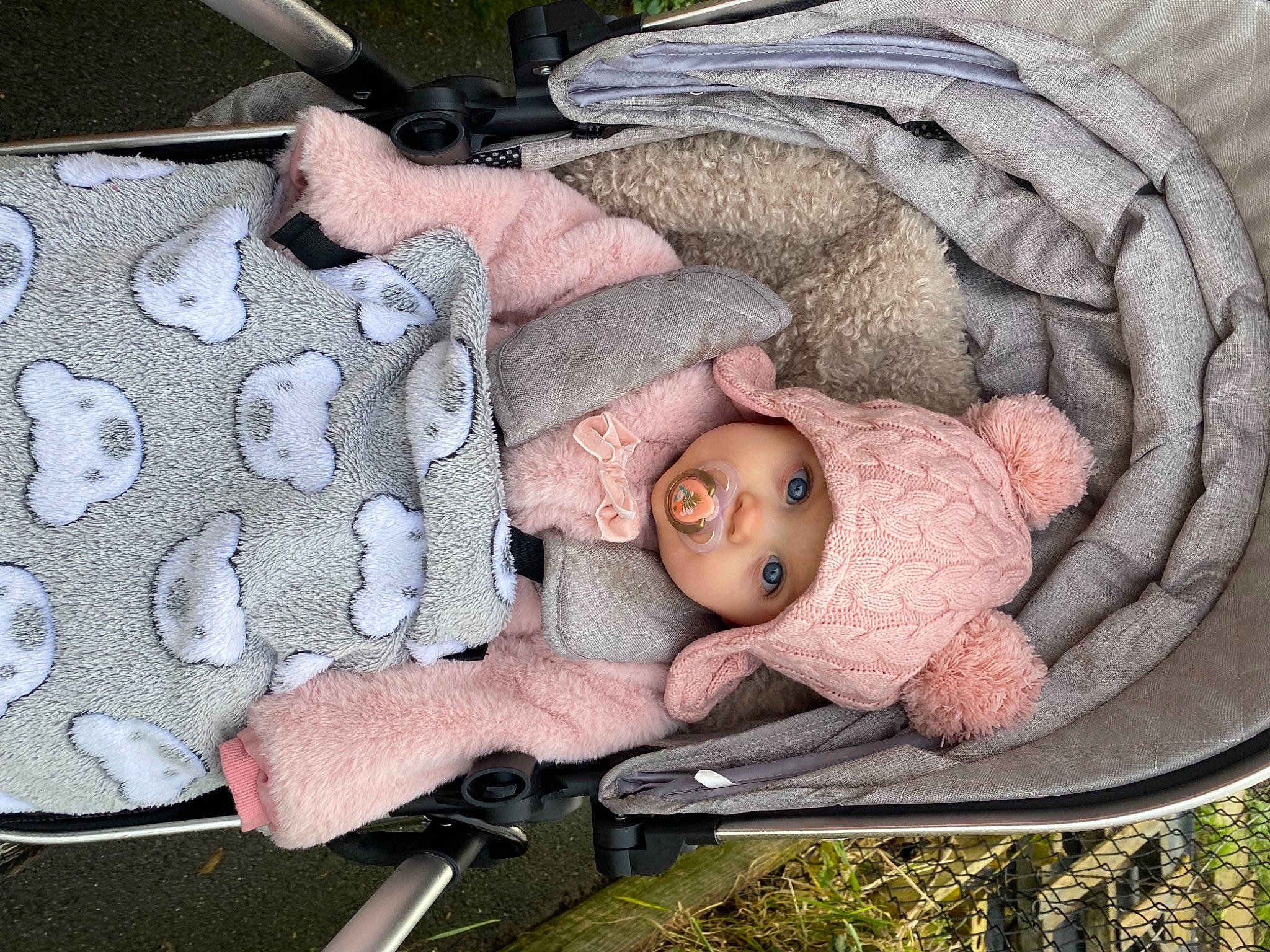 Hayley joined the competition — help win amazing prizes! baby, baby_carriage, baby_products, baby_safety, baby_toddler_clothing, child, comfort, eye, grass, headwear, infant_bed, linens, mammal, military_camouflage, pattern, person, skin, toddler, vertebrate, wood