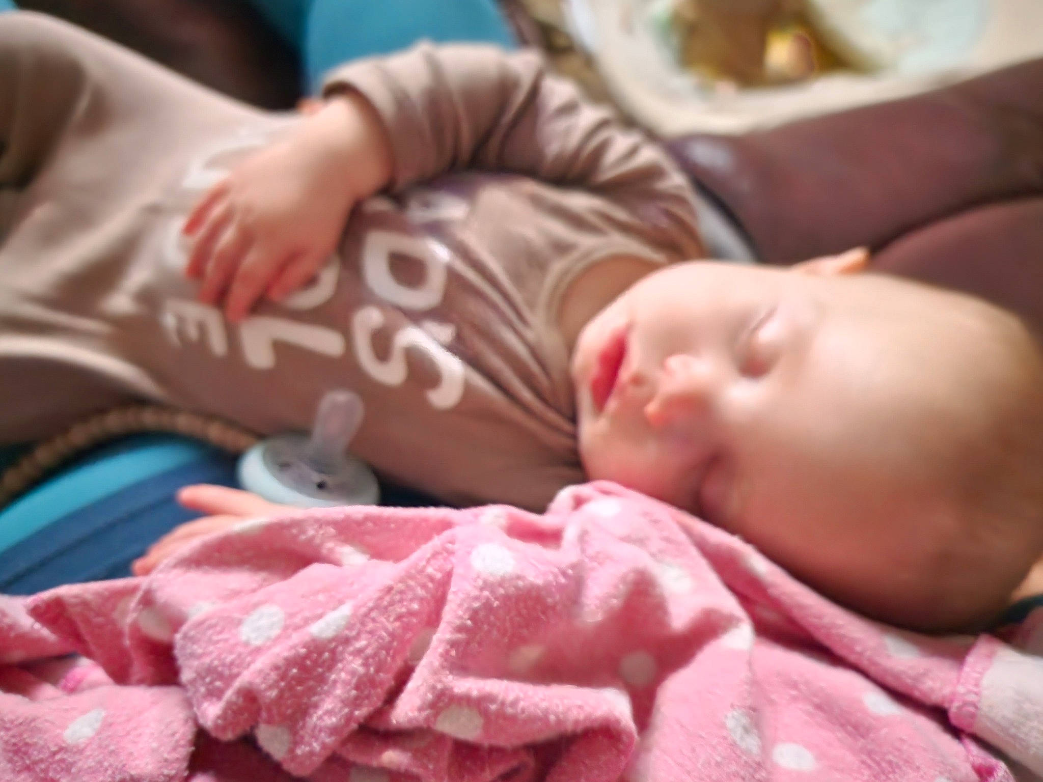 Colton is registered to the contest to win money with this photo: baby, baby_toddler_clothing, cheek, child, chin, comfort, face, facial_expression, finger, head, human, mammal, mouth, nose, people, person, pink, product, skin, textile