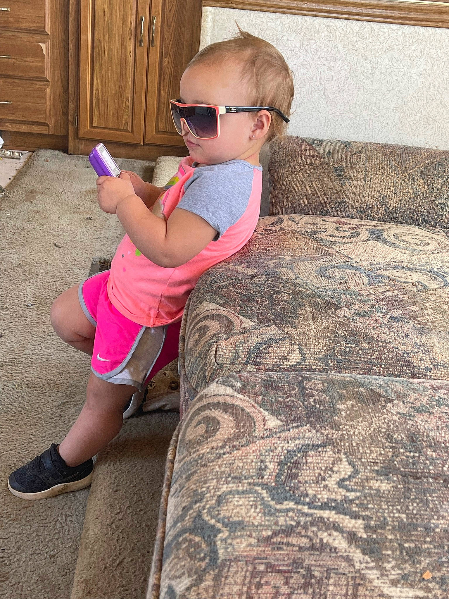 Braylee joined the competition — help win amazing prizes! eyewear, fun, glasses, goggles, human_leg, knee, leg, leisure, magenta, person, pink, sandal, shoe, shorts, sunglasses, t_shirt, thigh, toddler, vision_care, waist