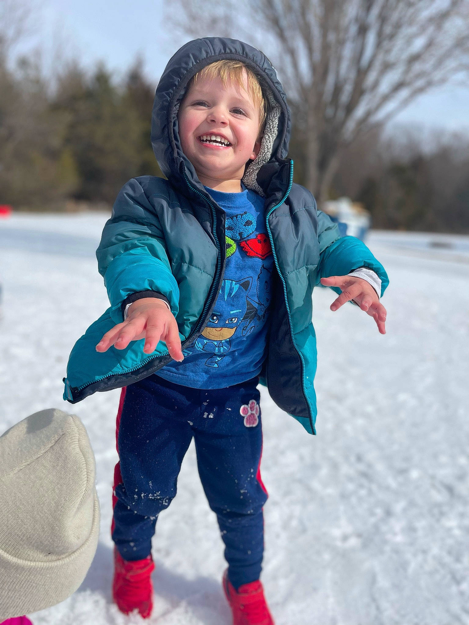 Brantley is registered to the contest to win money with this photo: child, electric_blue, face, freezing, fun, glove, happy, headwear, jacket, joy, leisure, people_in_nature, person, playing_in_the_snow, playing_with_kids, recreation, sky, sleeve, smile, snow