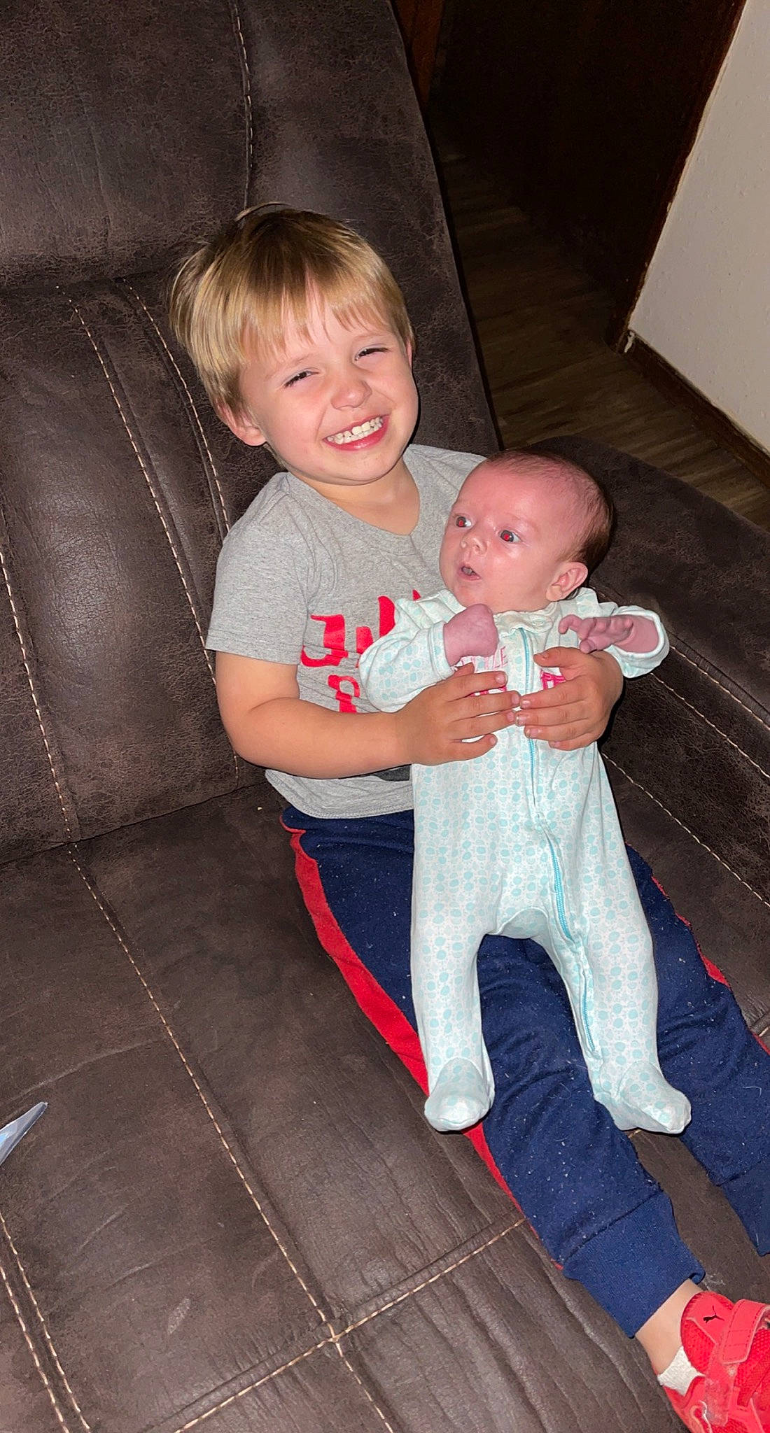 Brantley joined the competition — help win amazing prizes! arm, baby_toddler_clothing, cheek, comfort, couch, eye, face, finger, hair, hairstyle, happy, head, human_body, iris, joy, lap, leg, mouth, person, skin