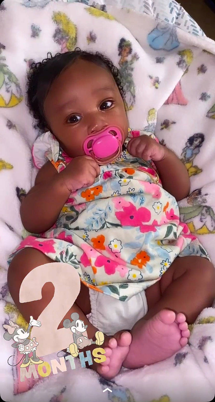 Legacy is registered to the contest to win money with this photo: baby, baby_products, baby_toddler_clothing, cheek, child, comfort, face, finger, fun, hand, happy, head, linens, magenta, nail, nose, person, pink, skin, sleeve