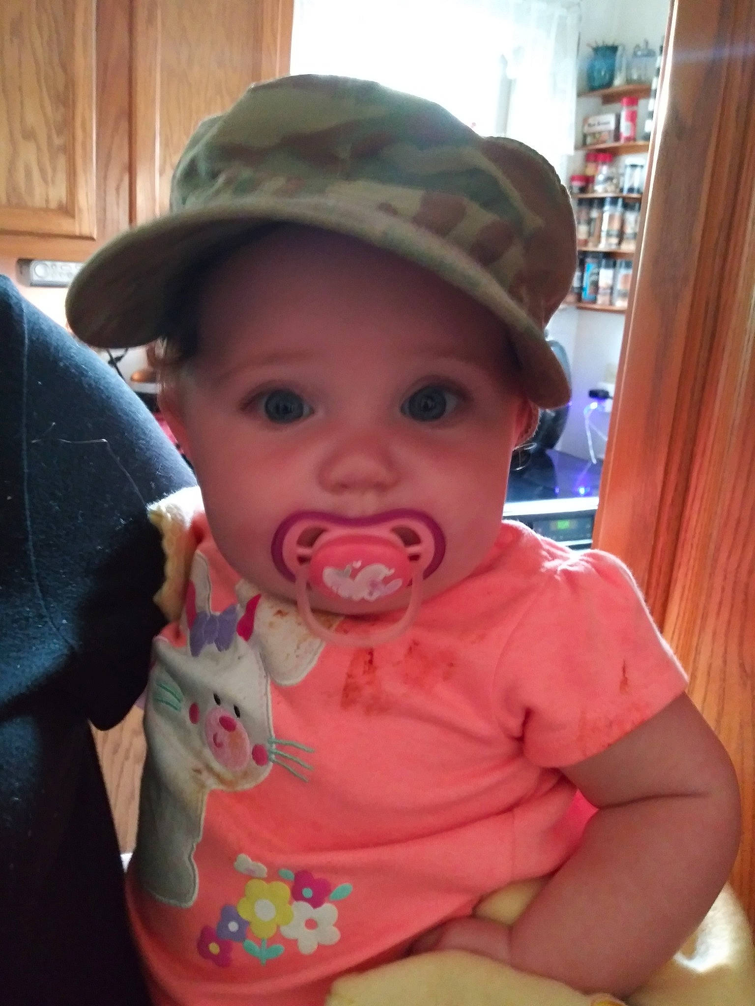 Loretta is registered to the contest to win money with this photo: baby, cheek, child, hat, headgear, headwear, lip, mouth, person, skin, smile, sun_hat, toddler