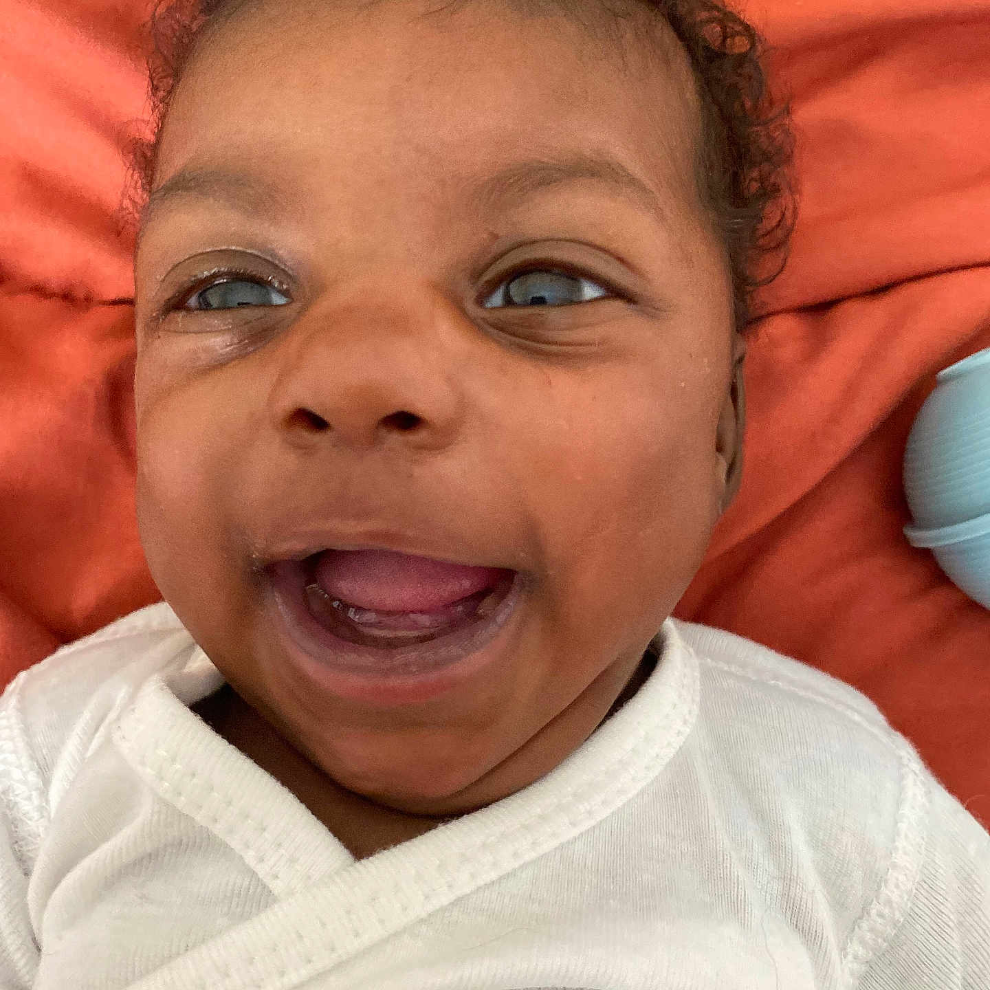 Amore is registered to the contest to win money with this photo: baby, babylaughing, face, happy, head, laughing, person, photography, portrait, smile