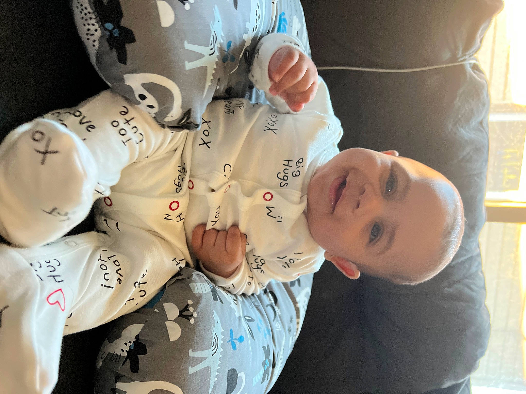 Jayceon joined the competition — help win amazing prizes! baby, baby_toddler_clothing, carmine, child, fashion_accessory, font, fun, gesture, happy, joy, person, personal_protective_equipment, sleeve, smile, sports_gear, toddler, tree, window