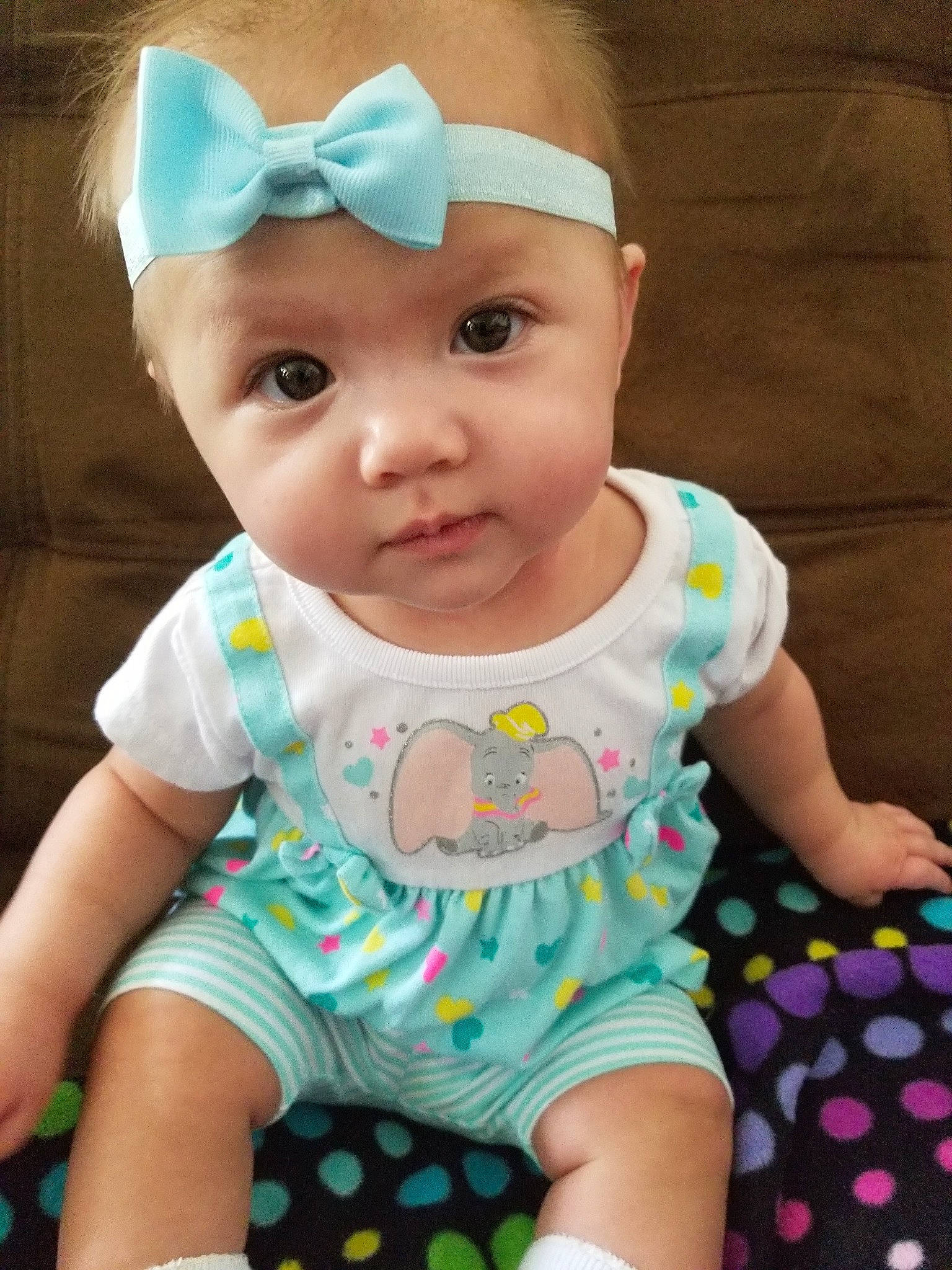 Julie is registered to the contest to win money with this photo: baby, baby_products, baby_toddler_clothing, child, design, hair_accessory, headband, pattern, person, polka_dot, product, toddler