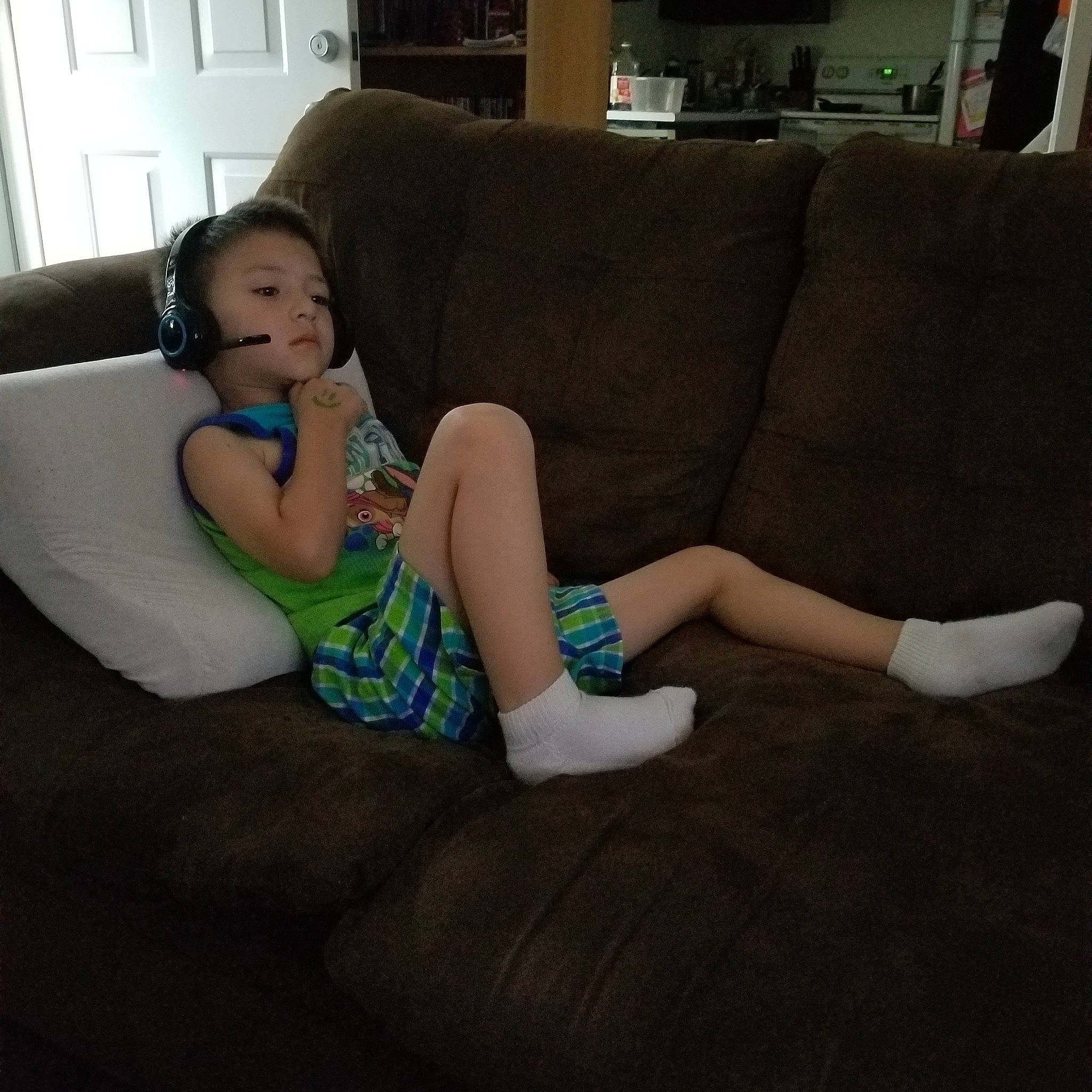 Carmeno joined the competition — help win amazing prizes! beauty, chair, child, comfort, couch, electronic_device, floor, flooring, furniture, gadget, head, human_leg, leg, person, shoe, sitting, sofa_bed, sportswear, thigh, toddler