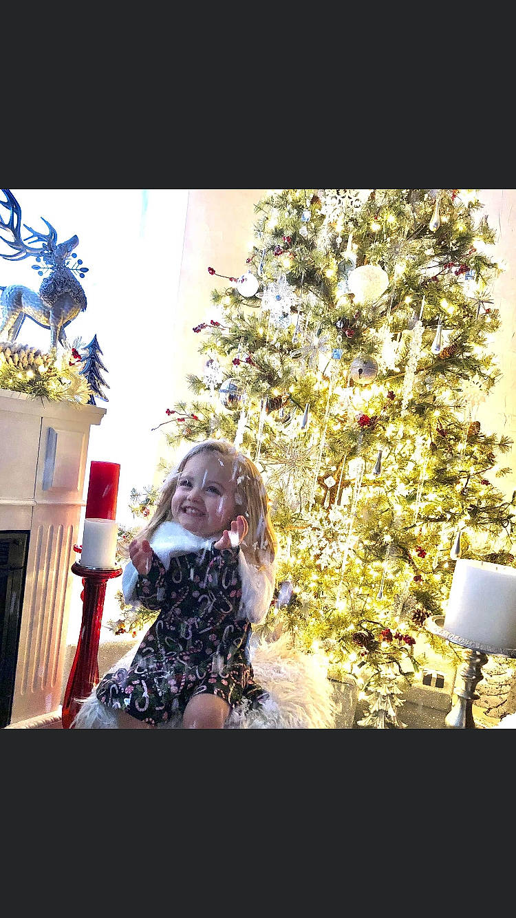 Addilyn is registered to the contest to win money with this photo: blossom, event, fashion_accessory, flash_photography, floral_design, flower, formal_wear, fun, grass, happy, joy, long_hair, magenta, people_in_nature, person, petal, plant, sitting, stock_photography, tints_and_shades