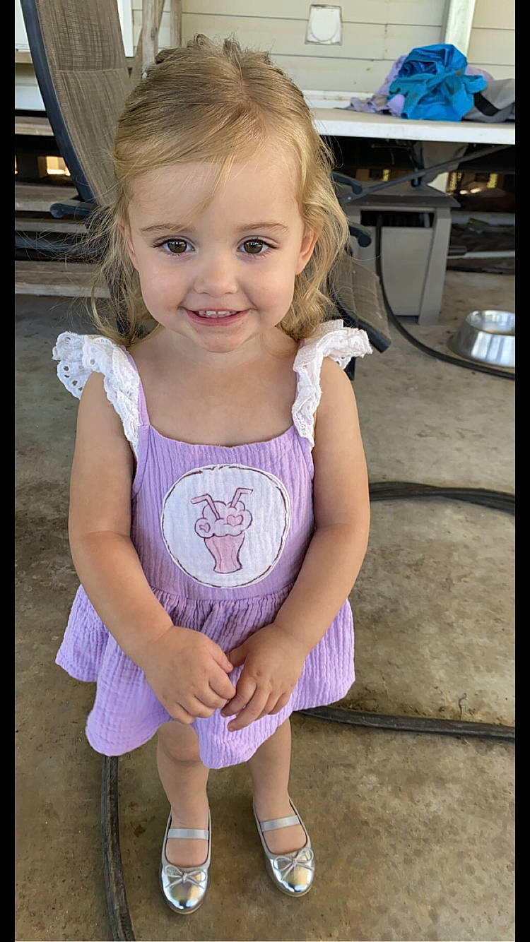 Addilyn is registered to the contest to win money with this photo: arm, baby_toddler_clothing, clothing, eyelash, face, hand, happy, head, iris, joint, joy, neck, person, photograph, pink, product, shoe, sleeve, smile, t_shirt