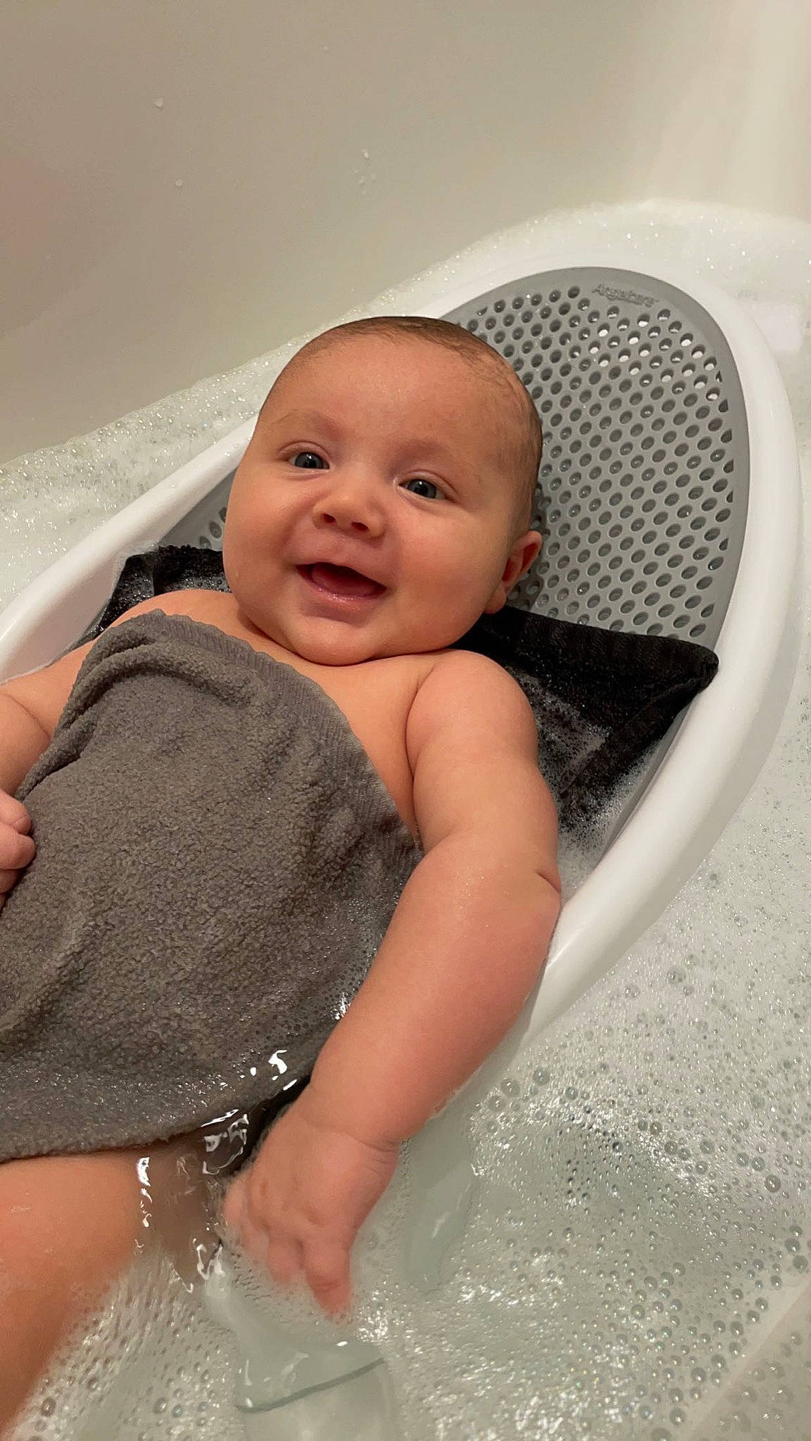 Hudson joined the competition — help win amazing prizes! baby, baby_toddler_clothing, bathing, cheek, child, comfort, eye, eyebrow, face, facial_expression, fun, hairstyle, happy, head, iris, mouth, person, plumbing_fixture, skin, smile