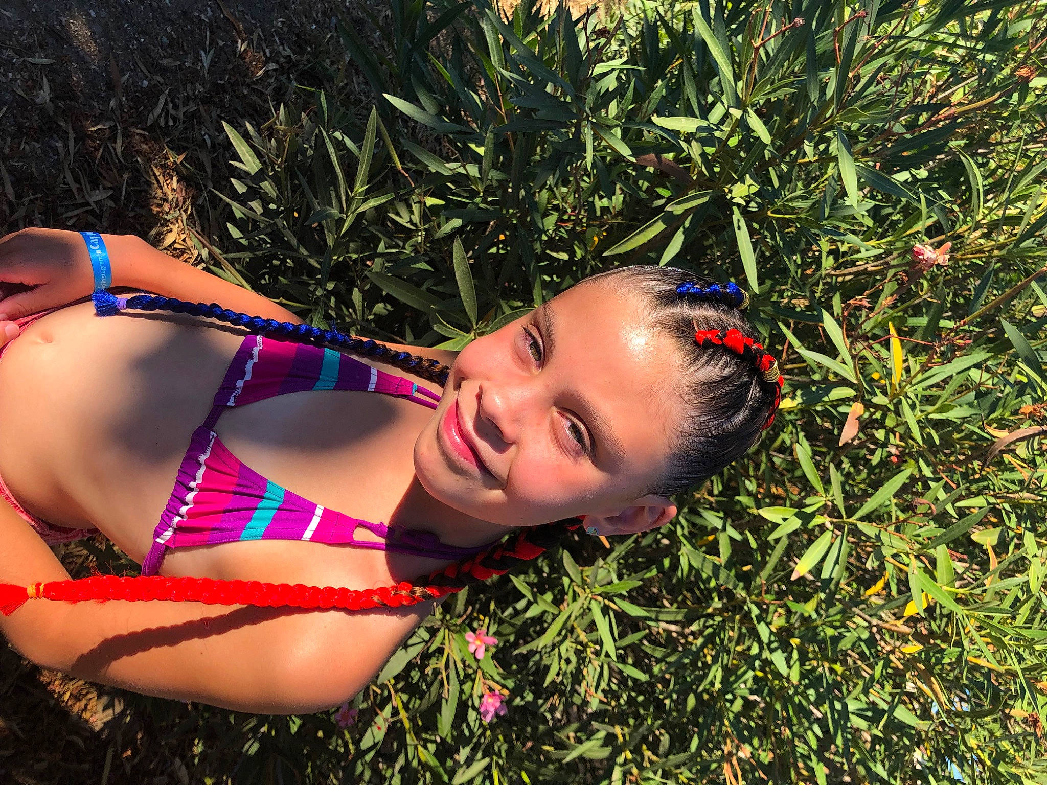 Clarisse participe au concours pour gagner de l'argent avec cette photo : abdomen, black_hair, brassiere, chest, flash_photography, grass, happy, human_leg, joy, lingerie, lingerie_top, navel, people_in_nature, person, plant, smile, swimsuit_top, swimwear, thigh, trunk