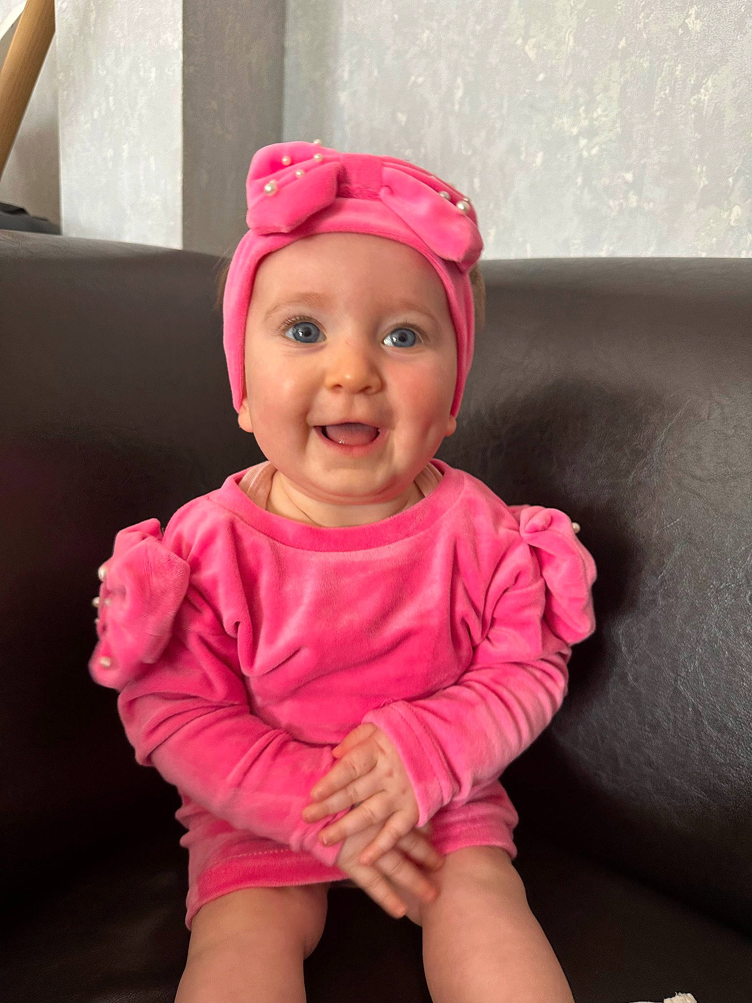 Mackenzie participe au concours pour gagner de l'argent avec cette photo : baby, baby_toddler_clothing, cap, cheek, child, eye, face, facial_expression, fashion_accessory, fun, happy, head, headwear, joy, magenta, person, pink, purple, skin, sleeve