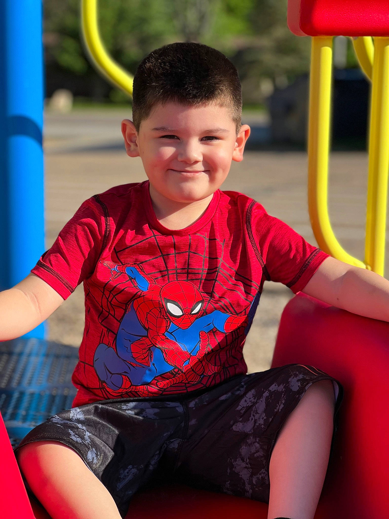 Fernando joined the competition — help win amazing prizes! baby_toddler_clothing, black, blue, eye, face, fun, hairstyle, happy, head, human_body, joy, leg, leisure, person, red, shorts, skin, sleeve, smile, standing