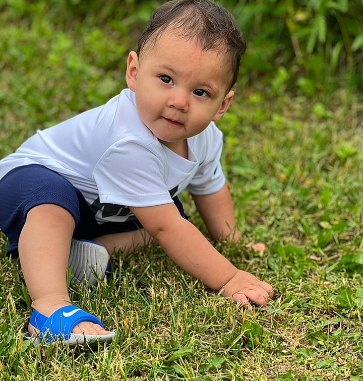 Mateo joined the competition — help win amazing prizes! baby_toddler_clothing, finger, flash_photography, flooring, fun, grass, grass_family, grassland, hair, hand, happy, head, human_body, lawn, meadow, nature, people_in_nature, person, plant, toddler