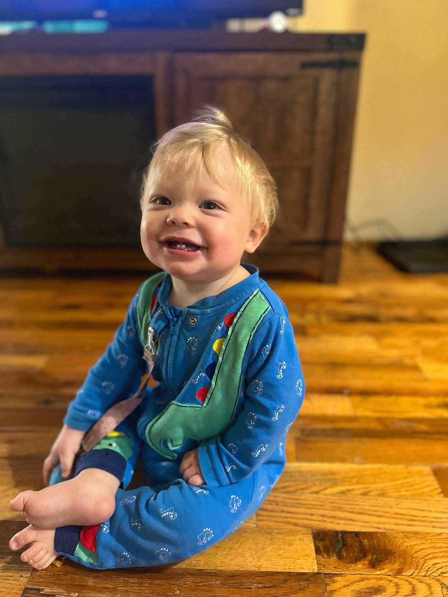 Maxton joined the competition — help win amazing prizes! baby_toddler_clothing, blue, child, electric_blue, floor, flooring, fun, happy, hardwood, iris, joy, person, sitting, skin, sleeve, smile, standing, television, toddler, varnish