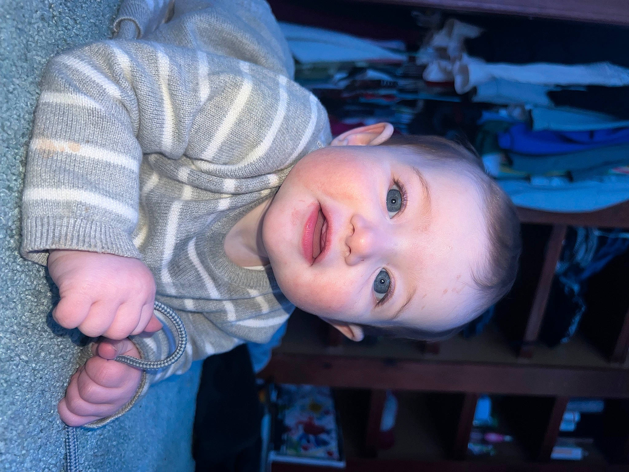 Leah is registered to the contest to win money with this photo: baby_toddler_clothing, blue, cheek, child, electric_blue, facial_expression, flash_photography, gesture, happy, iris, lip, mouth, nose, people, person, skin, sleeve, smile, thumb, toddler