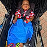 Michael joined the competition — help win amazing prizes! baby, black_fabric, blanket, casual, child, colorful, daylight, floral_pattern, foot, infant, outdoor, pavement, portrait, red_shirt, relaxing, safety_harness, sleeping, stroller, toy, water_bottle