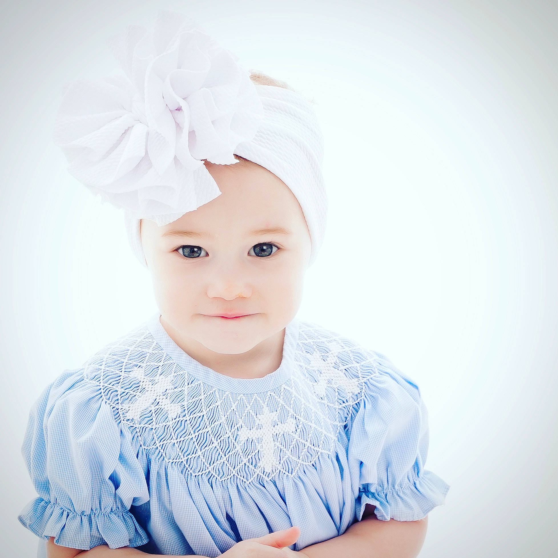 Kayleigh is registered to the contest to win money with this photo: art, baby, baby_toddler_clothing, bridal_accessory, costume_hat, electric_blue, embellishment, eye, eyelash, fashion_accessory, fashion_design, flash_photography, hair_accessory, happy, headpiece, headwear, human_body, iris, lip, person