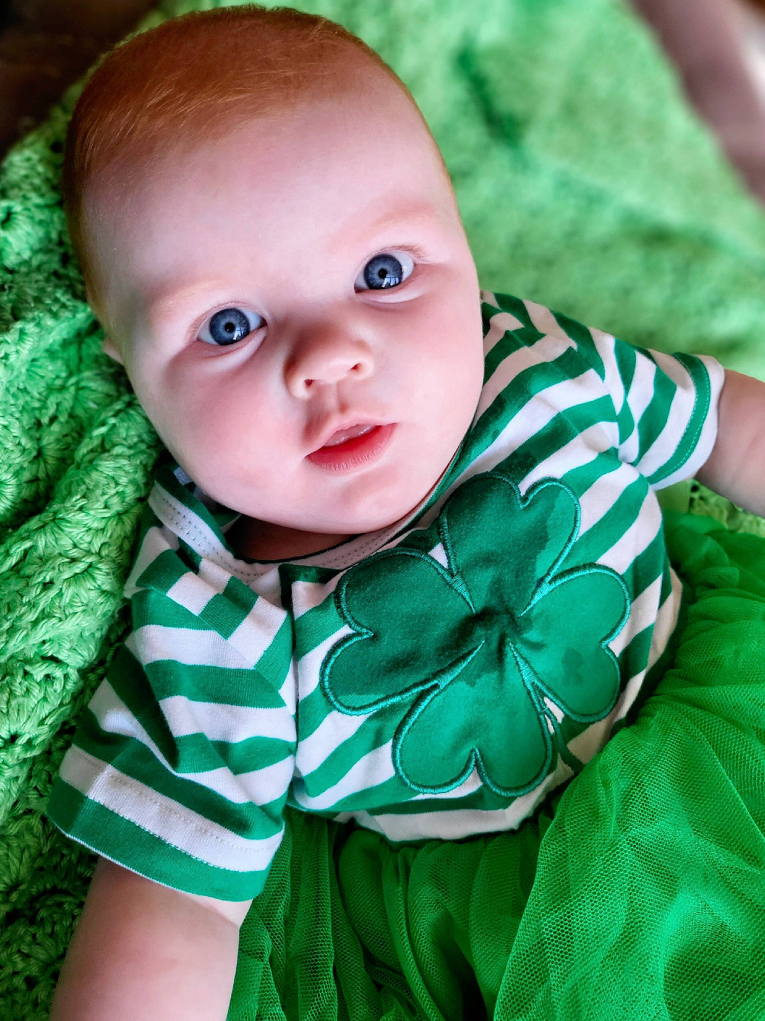 Savanna joined the competition — help win amazing prizes! baby, baby_toddler_clothing, cheek, child, eyelash, flash_photography, grass, green, happy, iris, leaf, linens, pattern, person, portrait_photography, sitting, skin, sleeve, smile, textile