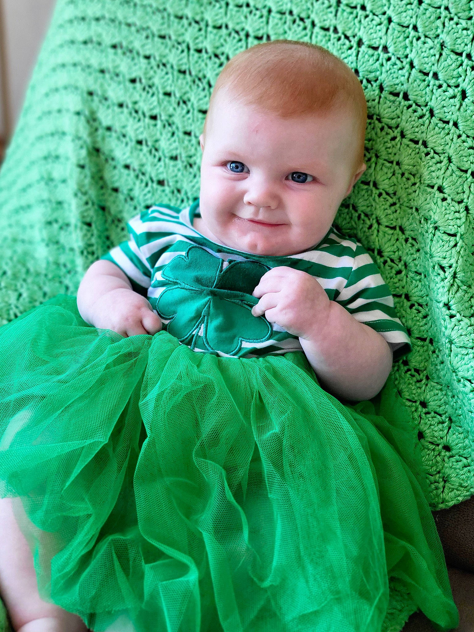 Savanna is registered to the contest to win money with this photo: aqua, azure, baby, baby_toddler_clothing, child, day_dress, dress, flash_photography, grass, green, happy, iris, joy, one_piece_garment, pattern, person, pink, skin, sleeve, smile