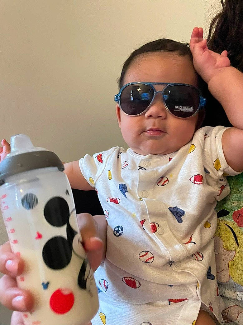 Jayvion joined the competition — help win amazing prizes! baby, baby_toddler_clothing, beauty, cheek, child, drinkware, eyewear, facial_expression, finger, goggles, hand, happy, nose, person, product, skin, sleeve, sunglasses, toddler, vision_care