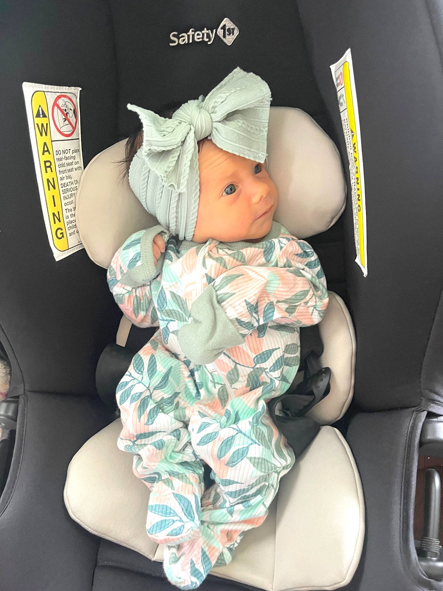 Elaine is registered to the contest to win money with this photo: auto_part, automotive_design, baby, baby_carriage, baby_in_car_seat, baby_safety, baby_sleeping, baby_toddler_clothing, car_seat, comfort, family_car, headwear, health_care, human_leg, motor_vehicle, pattern, person, service, thigh, thumb