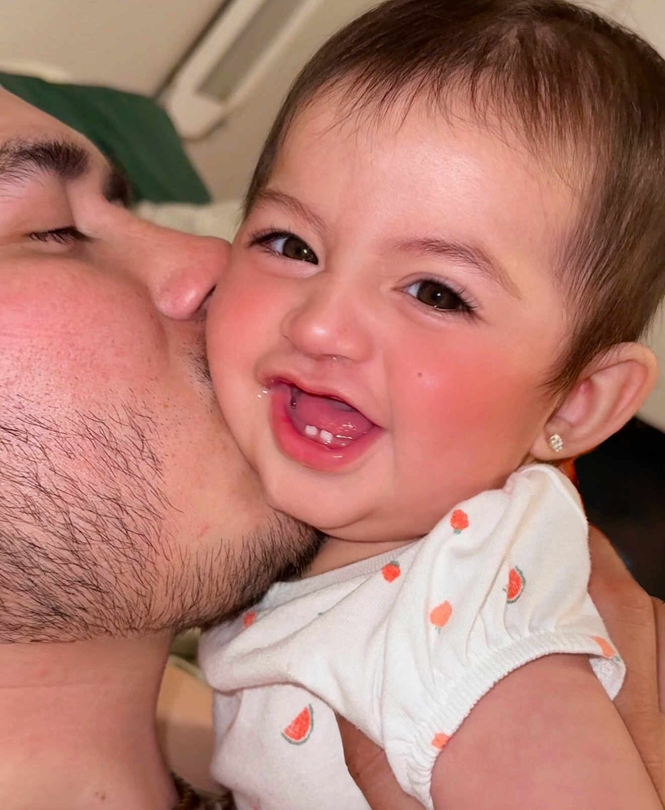 Leah Sofía joined the competition — help win amazing prizes! baby, child, man, kiss, smile, face, earring, love, affection, closeup, portrait, happy, holding, beard, skin, clothing, indoor, family, cute, infant