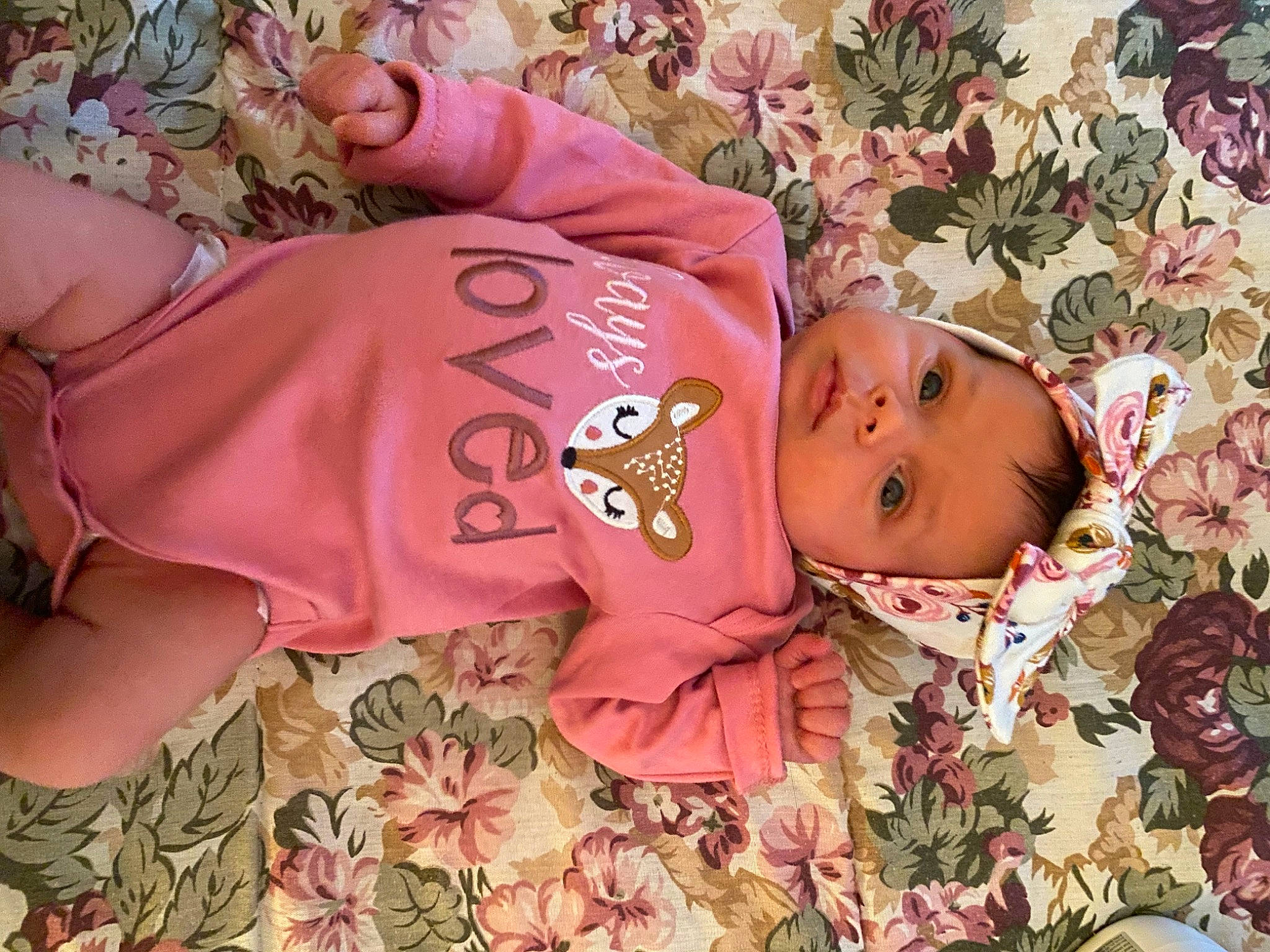 Cora-lee joined the competition — help win amazing prizes! baby, baby_products, baby_toddler_clothing, brown, cheek, child, facial_expression, grass, happy, head, headwear, linens, magenta, pattern, people_in_nature, person, pink, room, skin, sleeve