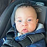 Zyaire joined the competition — help win amazing prizes! baby, child, car_seat, blue_eyes, hoodie, seatbelt, safety, infant, curly_hair, clothing, straps, closeup, person, cute, young_child, indoors, car_interior, seat, portrait, baby_boy