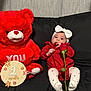 Amira joined the competition — help win amazing prizes! adorable, baby, black_background, bow_headband, couch, heart_motif, infant, milestone_sign, plush, portrait, red_outfit, red_rose, rose_stem, sitting, stuffed_animal, teddy_bear, toy, two_months, valentines_theme, white_tights