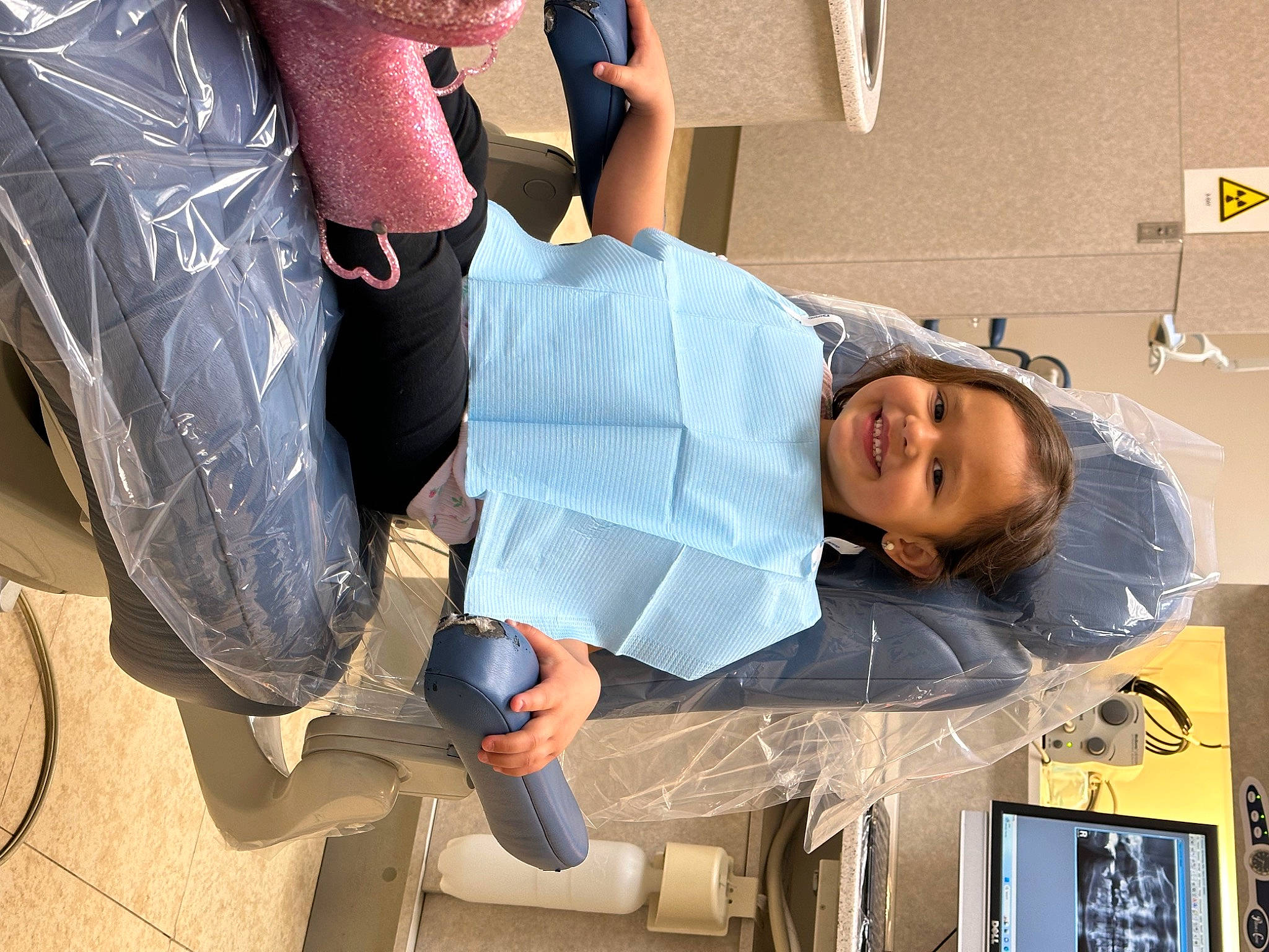 Mila joined the competition — help win amazing prizes! automotive_design, bag, calf, chair, child, comfort, denim, elbow, foot, human_leg, joy, knee, luggage_and_bags, person, shorts, sitting, smile, sportswear, t_shirt, thigh