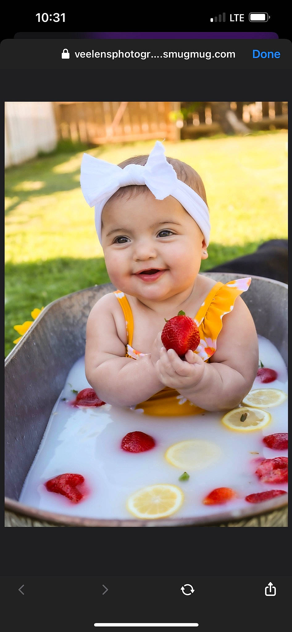 Teagan joined the competition — help win amazing prizes! baby, baby_products, baby_toddler_clothing, child, costume, facial_expression, fruit, fun, grass, happy, headwear, joy, laugh, leisure, person, pink, plant, recreation, sitting, skin