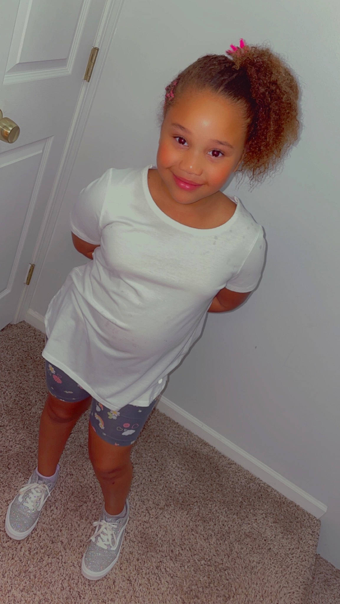 Kaelani joined the competition — help win amazing prizes! baby_toddler_clothing, blond, elbow, face, floor, flooring, foot, hair, head, human_leg, joint, joy, knee, pattern, person, sleeve, smile, sock, sportswear, t_shirt