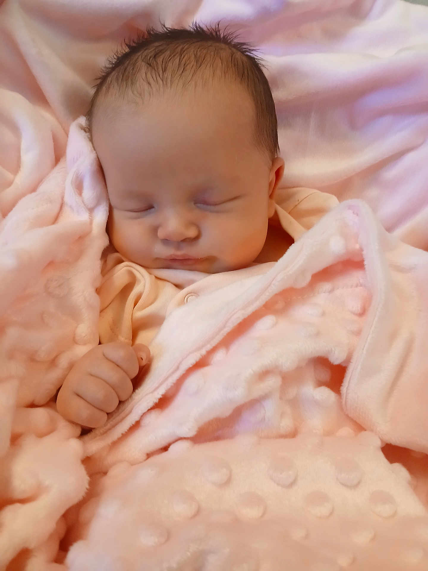 Aurora is registered to the contest to win money with this photo: baby, newborn, sleeping, blanket, pink, soft_texture, infant, cozy, cute, wrapped, peaceful, child, portrait, small_hand, closed_eyes, indoor, warm, comfortable, resting, toddler