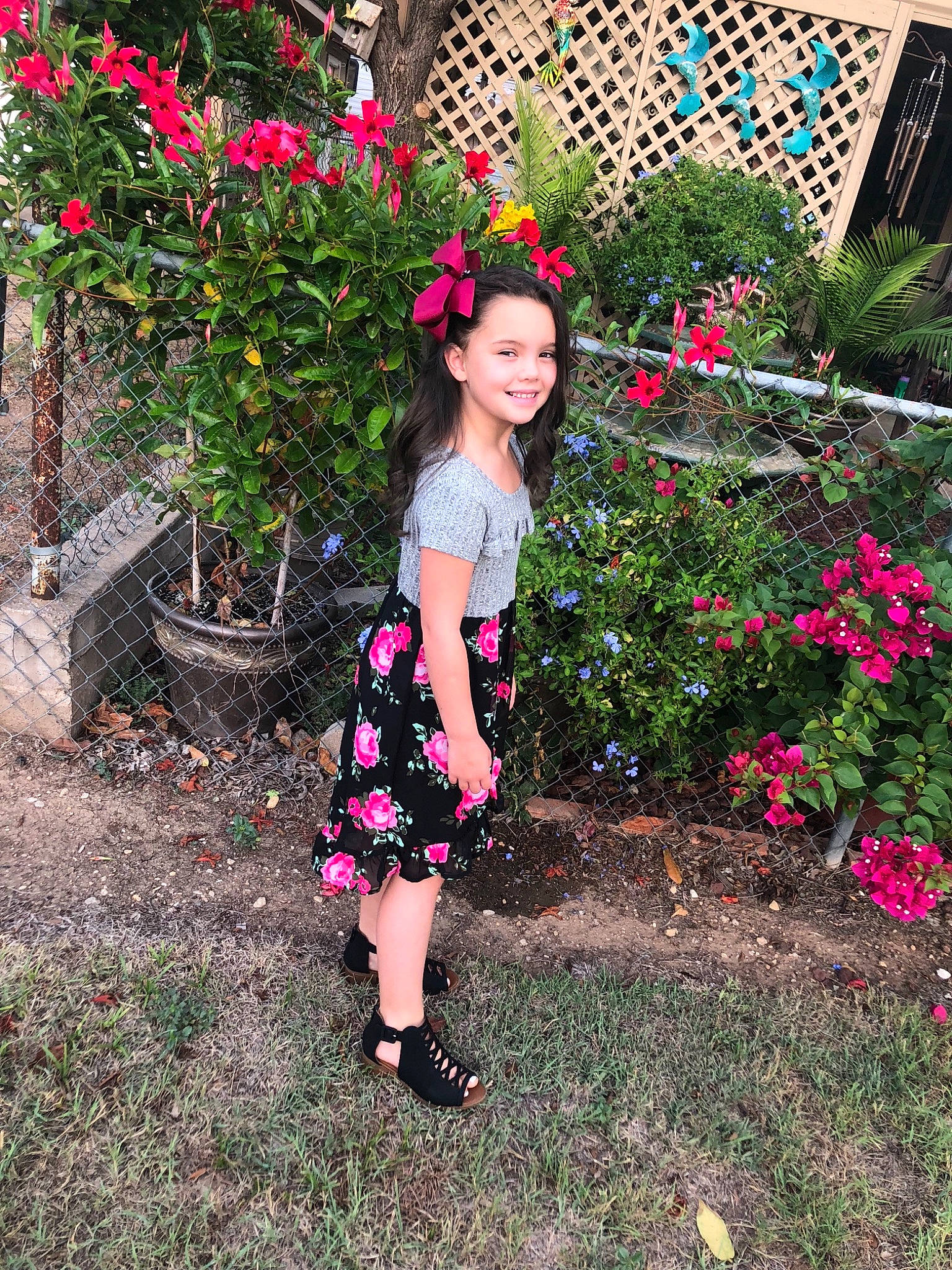 Jaelyn is registered to the contest to win money with this photo: child, day, design, flora, flower, flowering_plant, fun, garden, girl, grass, joy, pattern, person, pink, plant, polka_dot, recreation, shrub, spring, toddler