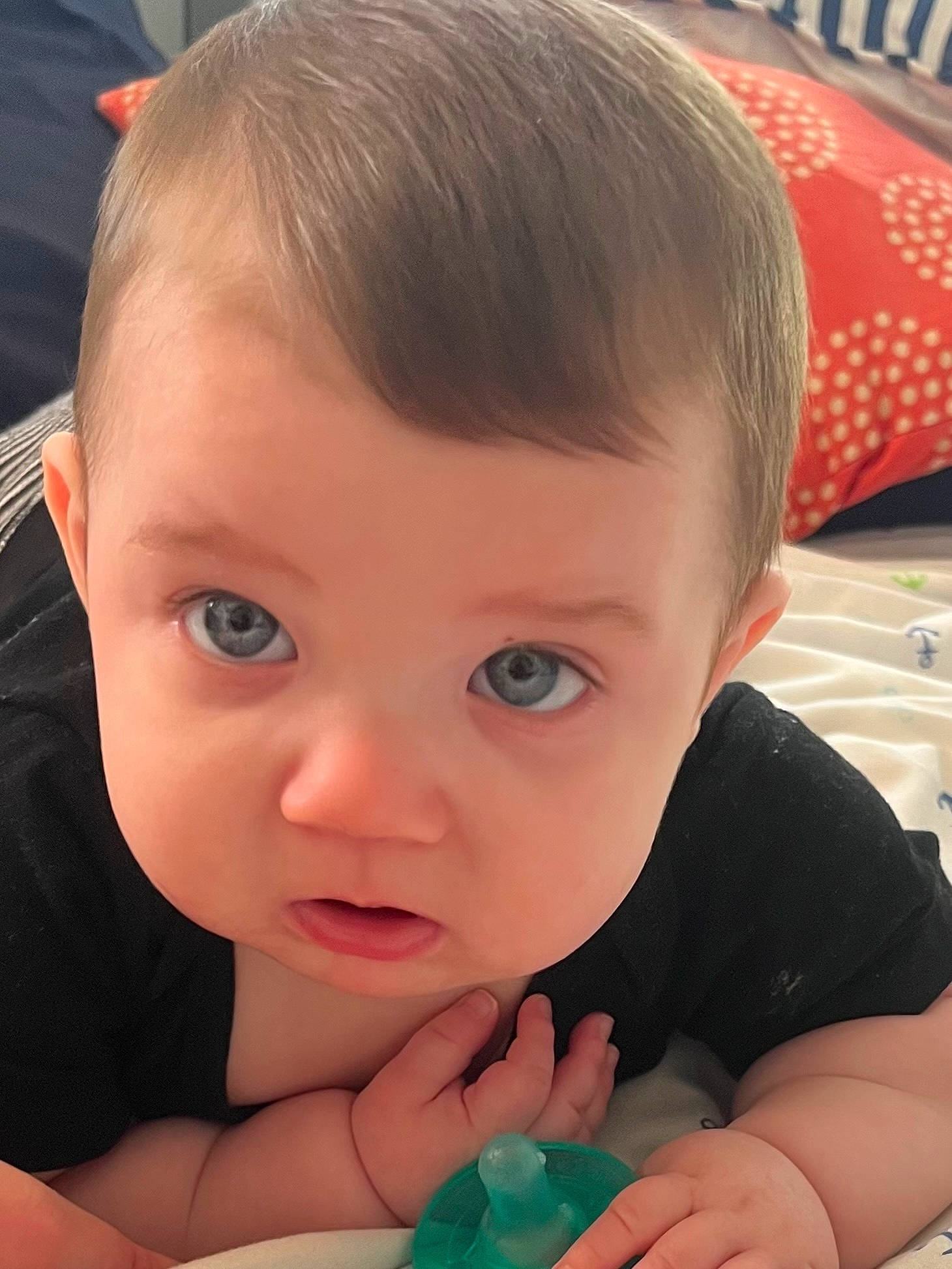 Casey is registered to the contest to win money with this photo: arm, baby, baby_toddler_clothing, blue, cheek, chin, ear, eyebrow, eyelash, finger, forehead, gesture, hand, happy, iris, lip, mouth, nose, person, product