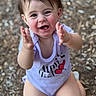 baby, child, clapping, smiling, happy, outdoor, portrait, face, eyes, hands, sitting, infant, toddler, purple_clothing, minnie_mouse, cartoon, woodland, leaves, bokeh, photography