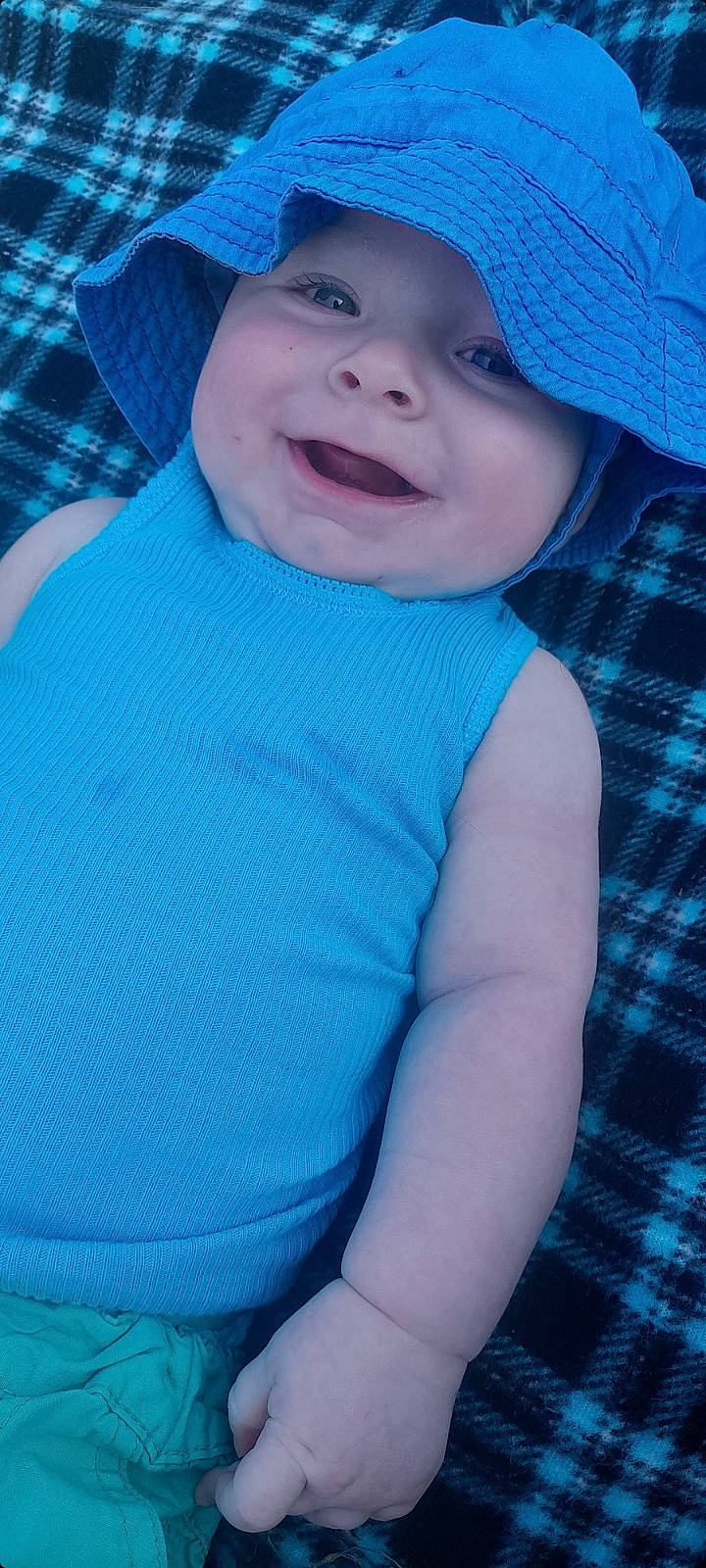 Jax joined the competition — help win amazing prizes! aqua, azure, baby, baseball_cap, blue, cap, cool, electric_blue, gesture, happy, hat, headwear, mouth, muscle, person, plaid, sleeve, smile, sun_hat, t_shirt