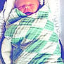 newborn, baby, blanket, swaddled, sleeping, infant, face, head, cozy, soft, pattern, checkered, closeup, child, person, wrapped, indoors, cute, peaceful, resting