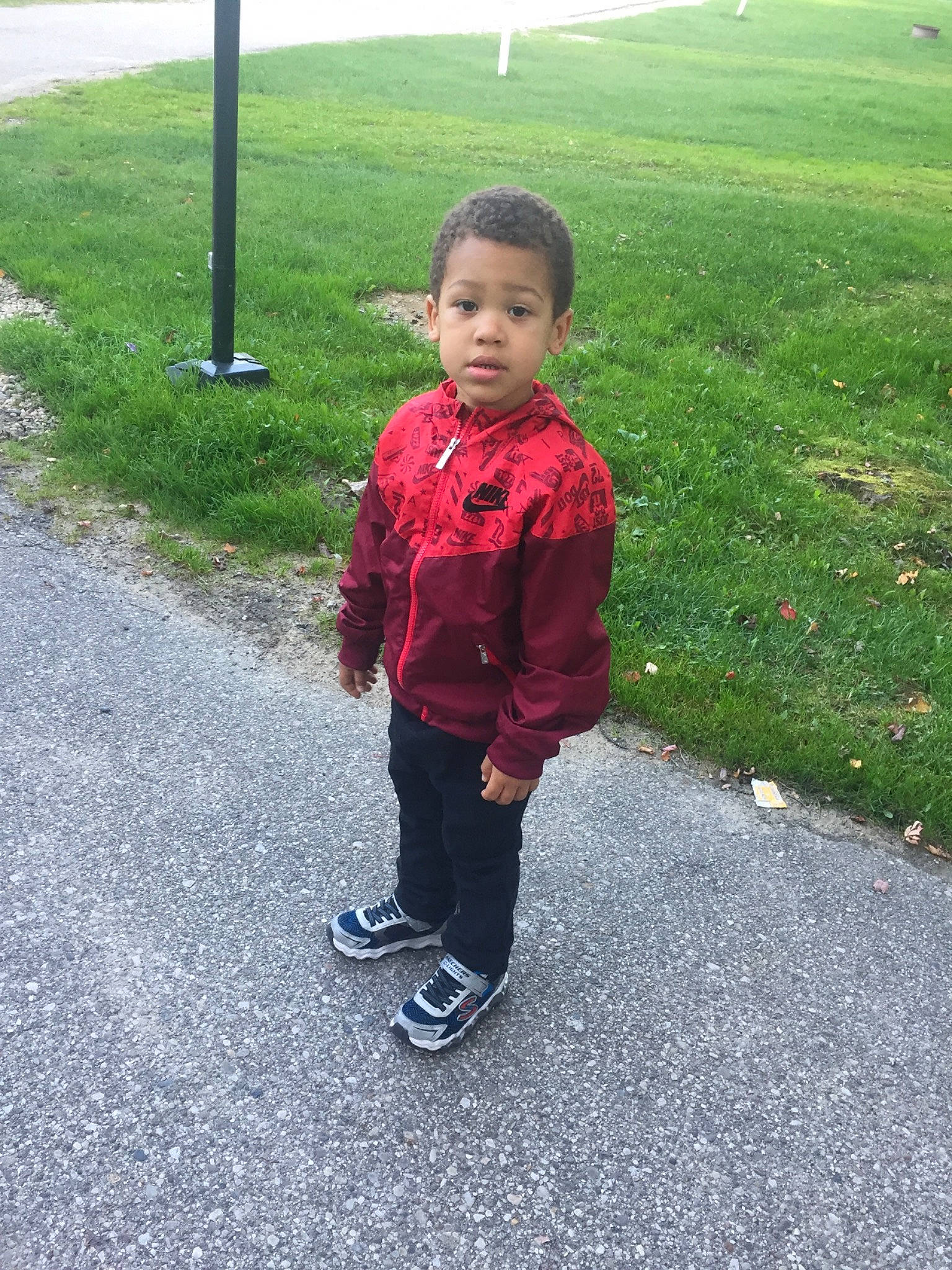 Lashawn is registered to the contest to win money with this photo: asphalt, child, grass, leisure, outerwear, person, play, standing, toddler